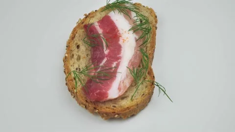 Sandwiches from rye bread with bacon Video stock 219569157