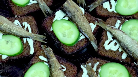 Sandwiches with sprat. selective focus. Stock Footage 148643371