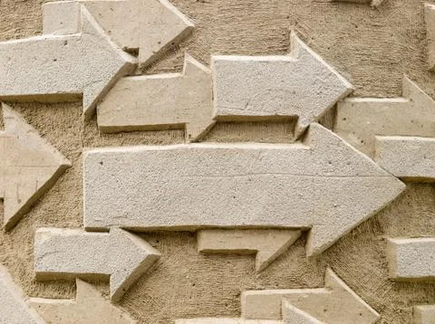 Sandy background with arrows Stock Photos