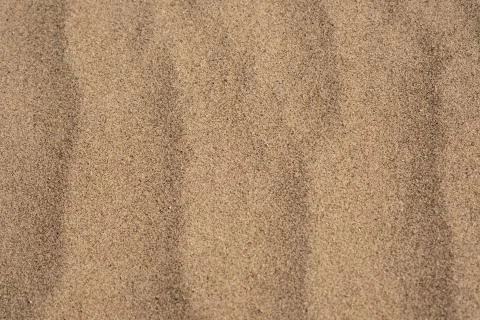 Sandy background, sand surface texture after strong wind Stock Photos