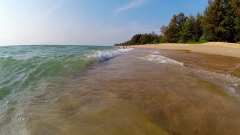 Sandy beach and azure waves, vacation concept Stock Footage 279845308