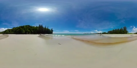 Sandy beach and a blue ocean. VR 360. Stock Footage 229677421