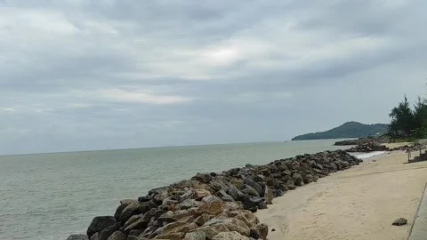 Sandy beach and blue sky with mountains far away Stock Footage 269690512