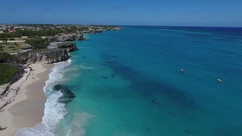 Sandy beach and blue waters in the Caribbean Stock Footage 88574500