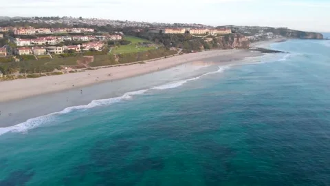 Sandy Beach and Blufftop Lawns, California Coast, Aerial Approach, 4K Stock Footage 147910861