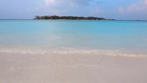 Sandy beach and clear lagoon In Maldives Stock Footage 125635406