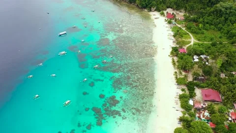 Sandy beach and palm trees. Philippines, Mindanao. Video stock 137083381