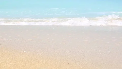 Sandy beach and sea waves with beautiful emerald water . Stock Footage 150416800