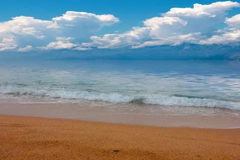Sandy beach and sky Stock Photos