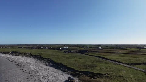 Sandy Beach and Tidal Pools at Seafield Pier County Clare Ireland Stockbeeldmateriaal 337853376