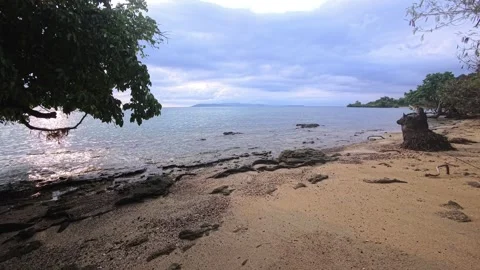 Sandy beach and turquoise water on a tropical paradise island in Thailand Stock Footage 332486323