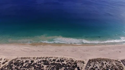 Sandy beach blue ocean coastline aerial footage Stock Footage 108774499
