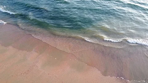 A sandy beach with breaking waves in Ao Nang areal Stock Footage 129035920
