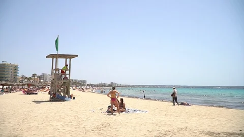 Sandy beach by the city Stock Footage 128349007