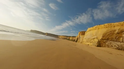Sandy beach with a cliff in Australia. Fpv Drone Video. Video stock 240011048