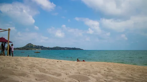 Sandy beach with cloudy sky timelapse Stock Footage 50645209