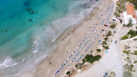 Sandy beach on crystal clear Mediterranean Sea, aerial view, Cyprus Stock Footage 107276325