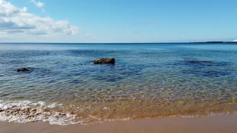 Sandy beach with Crystal clear water Stock Footage 134405729