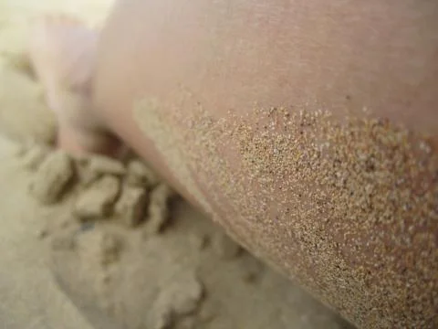 Sandy beach day closeups Stock Photos