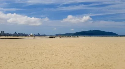 Sandy beach with distant horizon Stock Photos