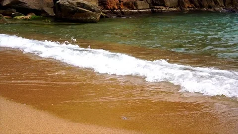 Sandy beach at the edge of the waves Stock Footage 195205920