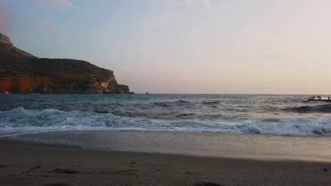 Sandy beach, flooded with the waves of the rough sea. Stock Footage 228875315