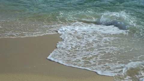 Sandy beach with foaming waves Stock Footage 75012696
