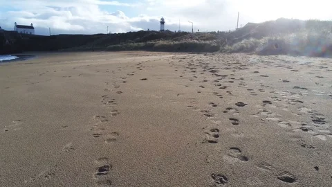 Sandy beach with Footprints Stock Footage 104926503