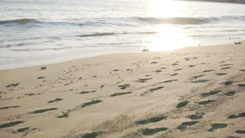 Sandy beach with footprints at sunset, Turkey, Alanya Stock Footage 236535131