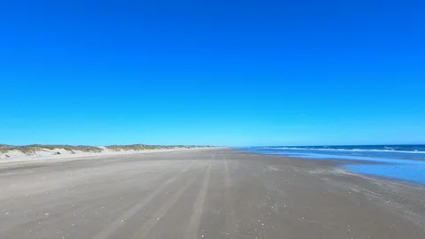 Sandy beach Gulf of Mexico surf Padre Island Texas POV 4K Stock Footage 102436391