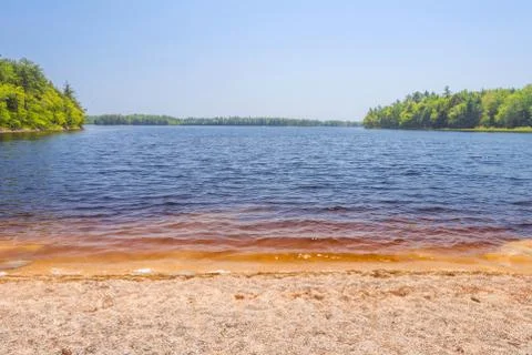 Sandy Beach on Lake Stock Photos