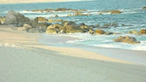 A sandy beach next to the ocean Stock Footage 156013253