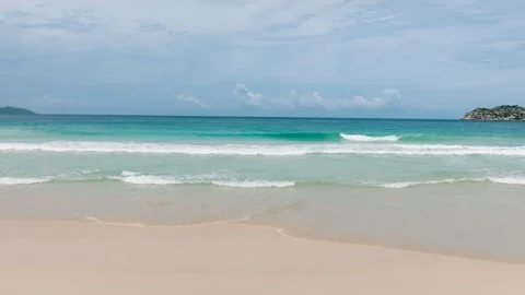 Sandy beach with ocean surf and waves. Seychelles, Mahe. Stock Footage 300909991