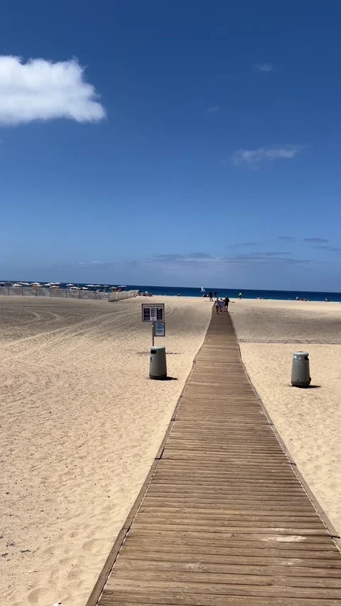 Sandy beach panorama wooden path lifeguard tower Morro Jable Fuerteventura HD Stock-Footage 342028808