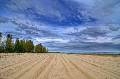 Sandy beach Stock Photos