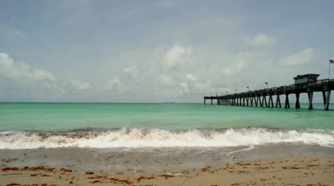 Sandy Beach with Pier Stock Footage 39513203
