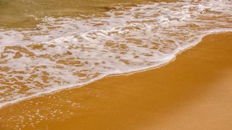 Sandy beach shore line texture background An image of a sandy beach shore ... Stock Photos