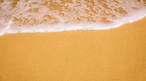 Sandy beach shore line texture background An image of a sandy beach shore ... Stock Photos