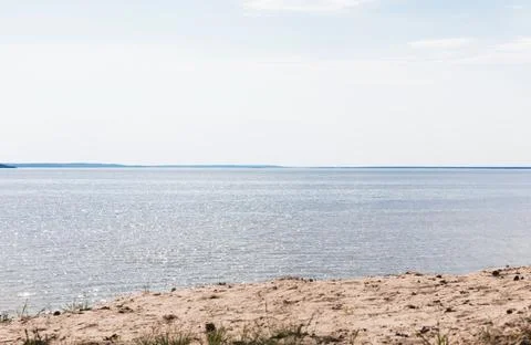 Sandy beach tranquil sea sky Stock Photos