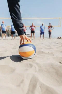 Sandy beach under clear blue sky Stock Photos