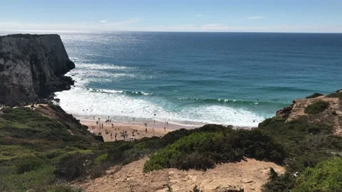 Sandy beach in the valley between the cliffs, a surfer's paradise Stock Footage 132276236
