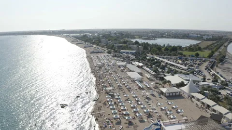 The sandy beach is washed by water on both sides Stock Footage 146247251