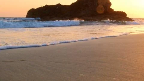 Sandy beach waves and foam at sunset Harris Beach Oregon Coast Oregon 14 Stock Photos
