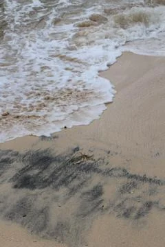 Sandy beach with waves 스톡 사진