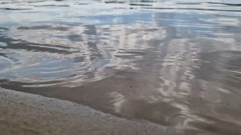 Sandy beach with waves. Recreation at the sea, river Stock Footage 263448762