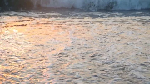 Sandy beach waves at sunset Ocean Stock Footage 76121817