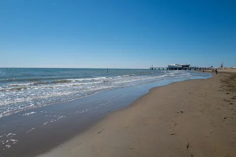 Sandy beach without bathers Stock Photos