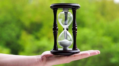 Sandy clock in a man's hand Stock Footage 62521040
