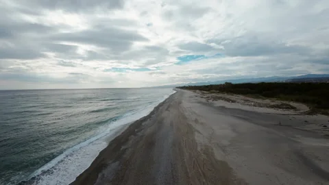 Sandy Coastline at sunset light Stock Footage 238808390
