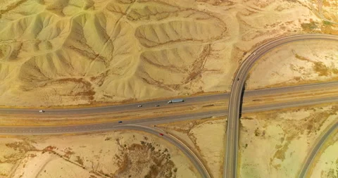 Sandy dunes crossed by the quick highways.  Stock Footage 212383988